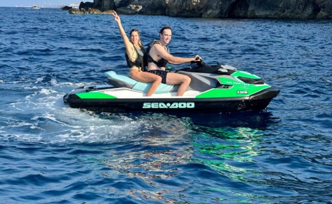 image of couple enjoy a jetski rental in malta
